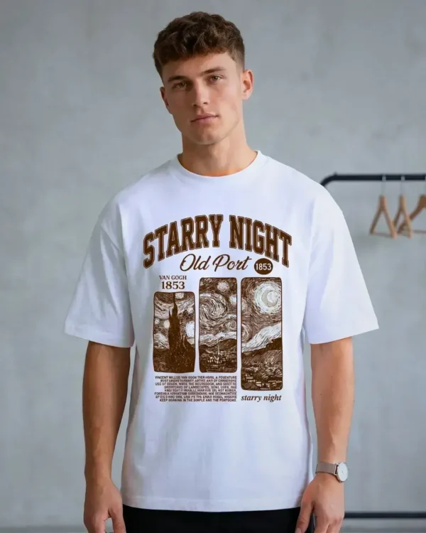 Male model wearing the Starry Night oversized vintage tees in a studio.
